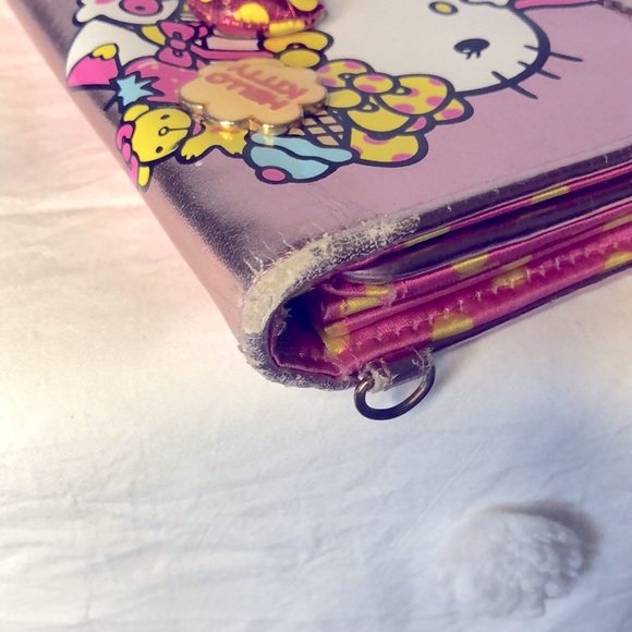 HELLO KITTY metallic pink wallet. Holds up to 16 cards. Polka dot lining inside. - Picture 7 of 16